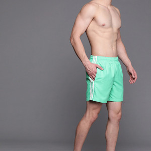 Men Green Solid 3-Stripes Sustainable Swim Shorts